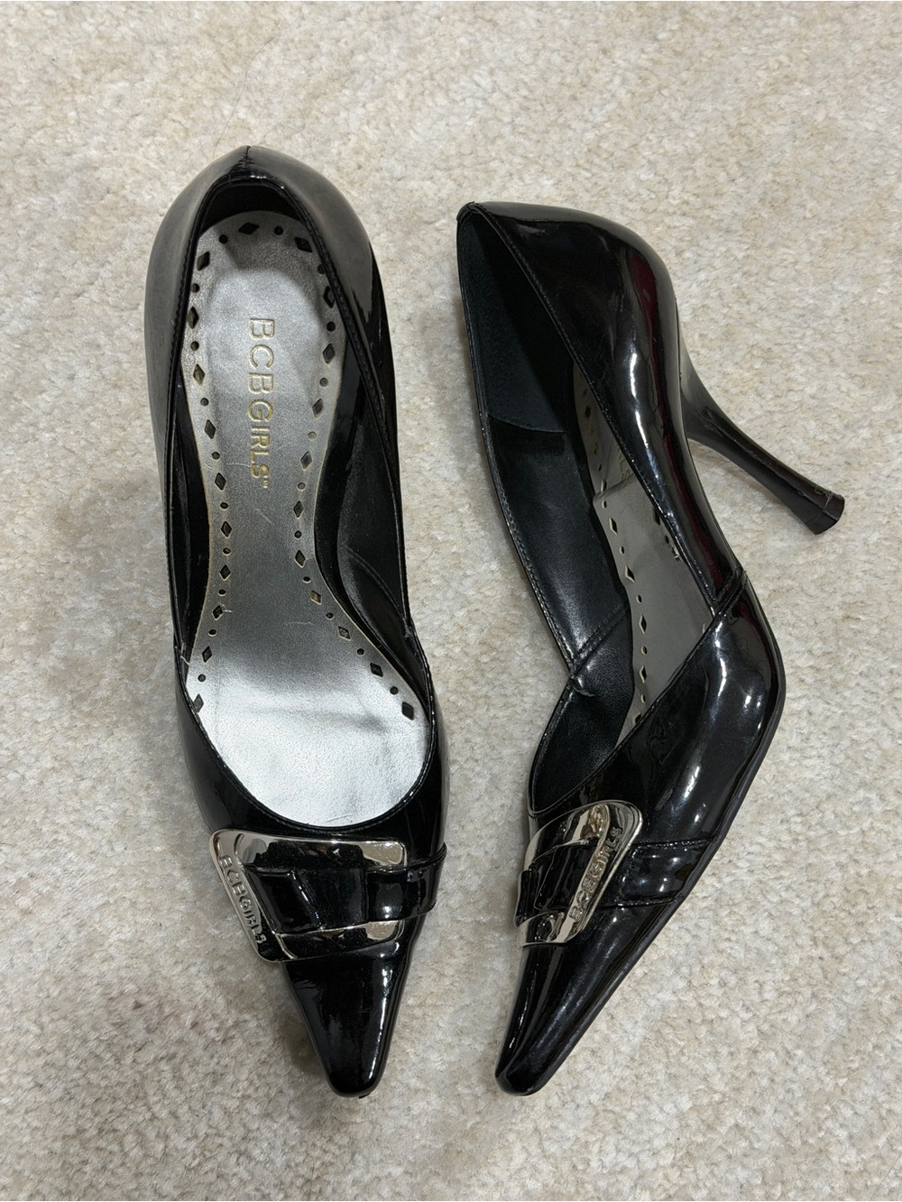 BCBGirls Black Patent Pointed Toe Heels with Buckle Accent
